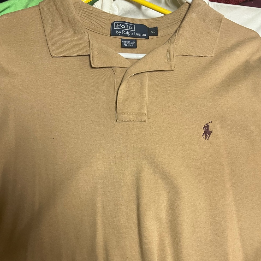 Like brand new only worn 4 times beautiful color polo by Ralph Lauren